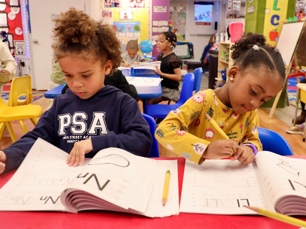 Children learning letters and early literacy at Park Street Academy