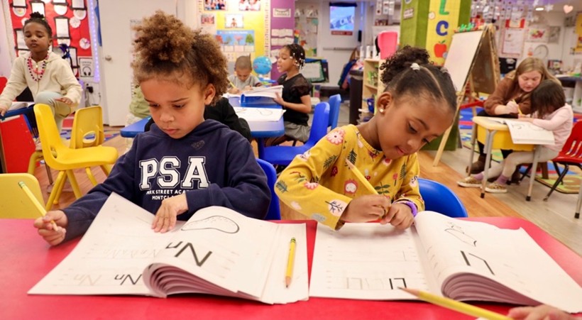 Children learning letters and early literacy at Park Street Academy