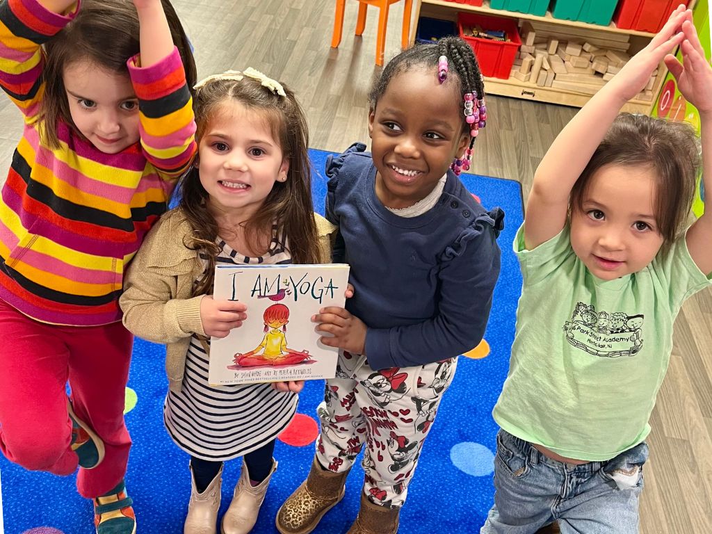 Pre-K children enjoying a yoga enrichment club at Park Street Academy